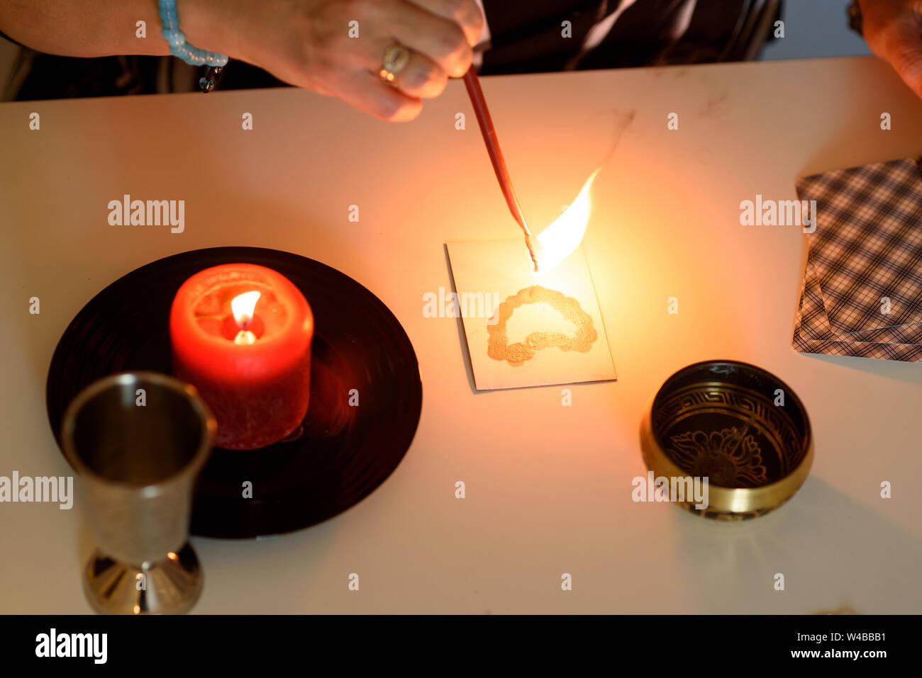 Fortune teller wonders on the candle, fortune teller make magic love