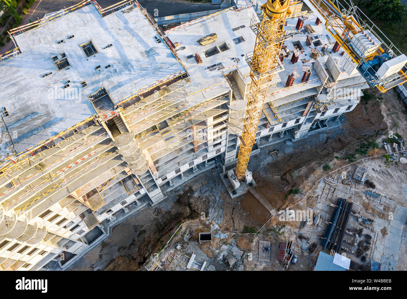building of new modern apartments. crane at construction site. photo