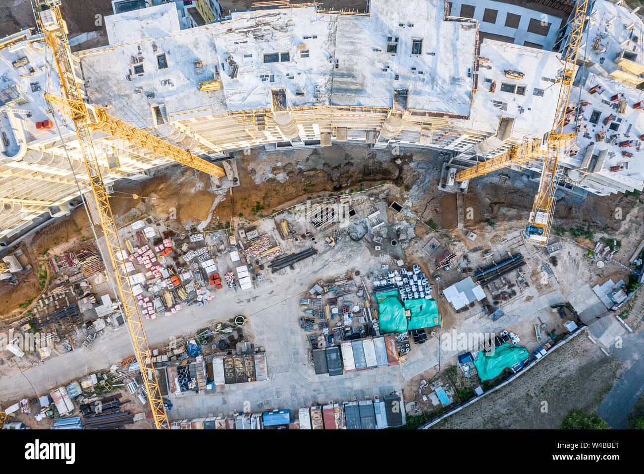 aerial top view of new modern apartment building under construction ...