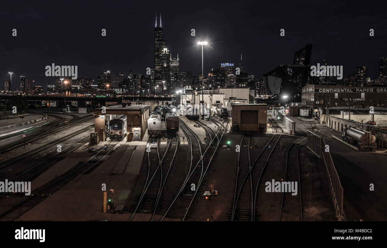 BNST railroad yard and Chicago skyline at night shot from west 18th street, Chinatown Stock Photo