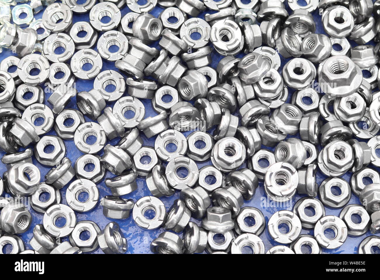 small bolts and nuts by manufacturing process ; tapping Stock Photo Alamy