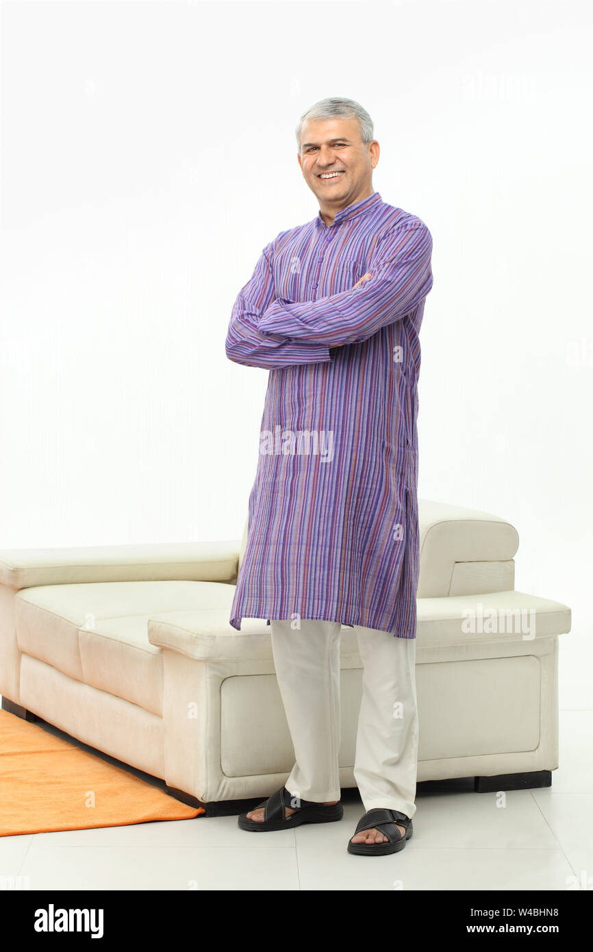 Old man smiling with his arms crossed Stock Photo Alamy