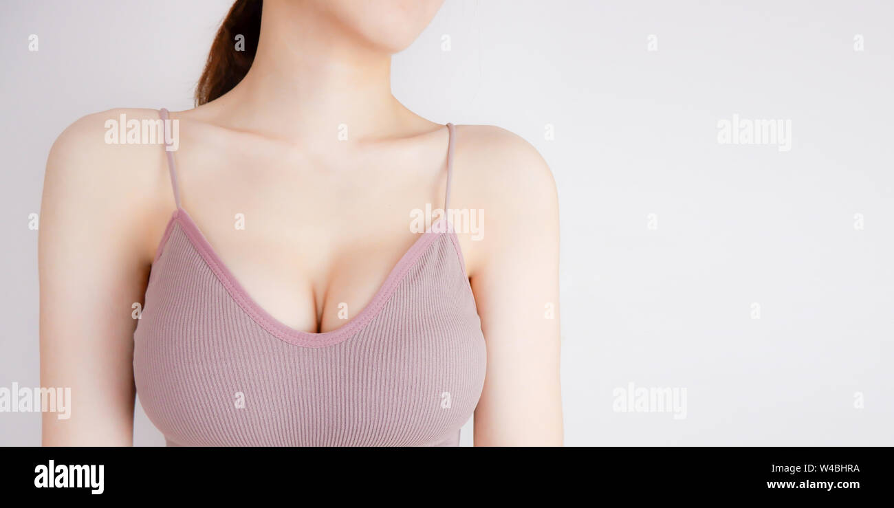 beautiful female breasts in a blue bra Stock Photo - Alamy