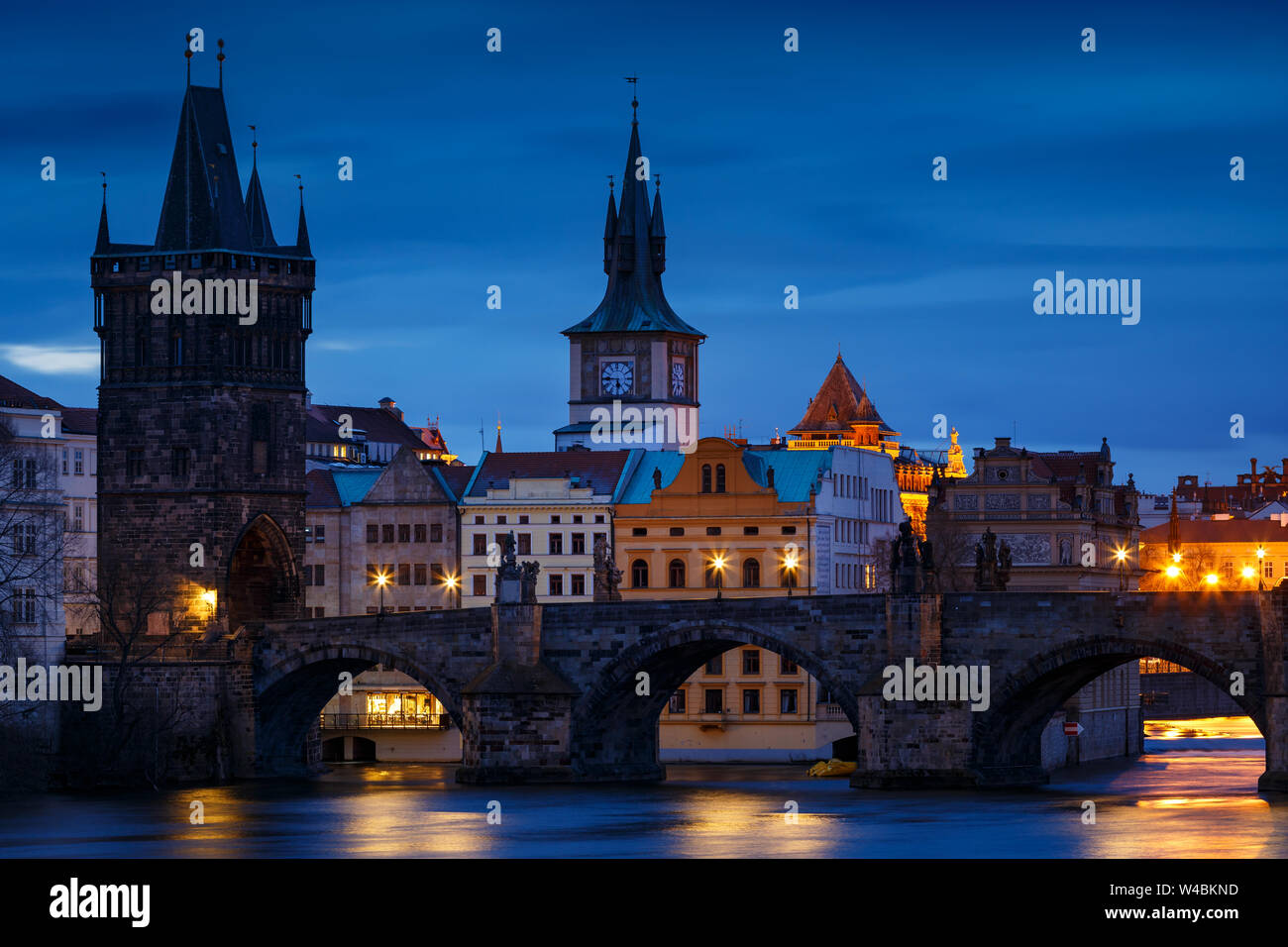 Morning view of Charles Bridge and Old Town Bridge Tower over river Vltava. Stock Photo