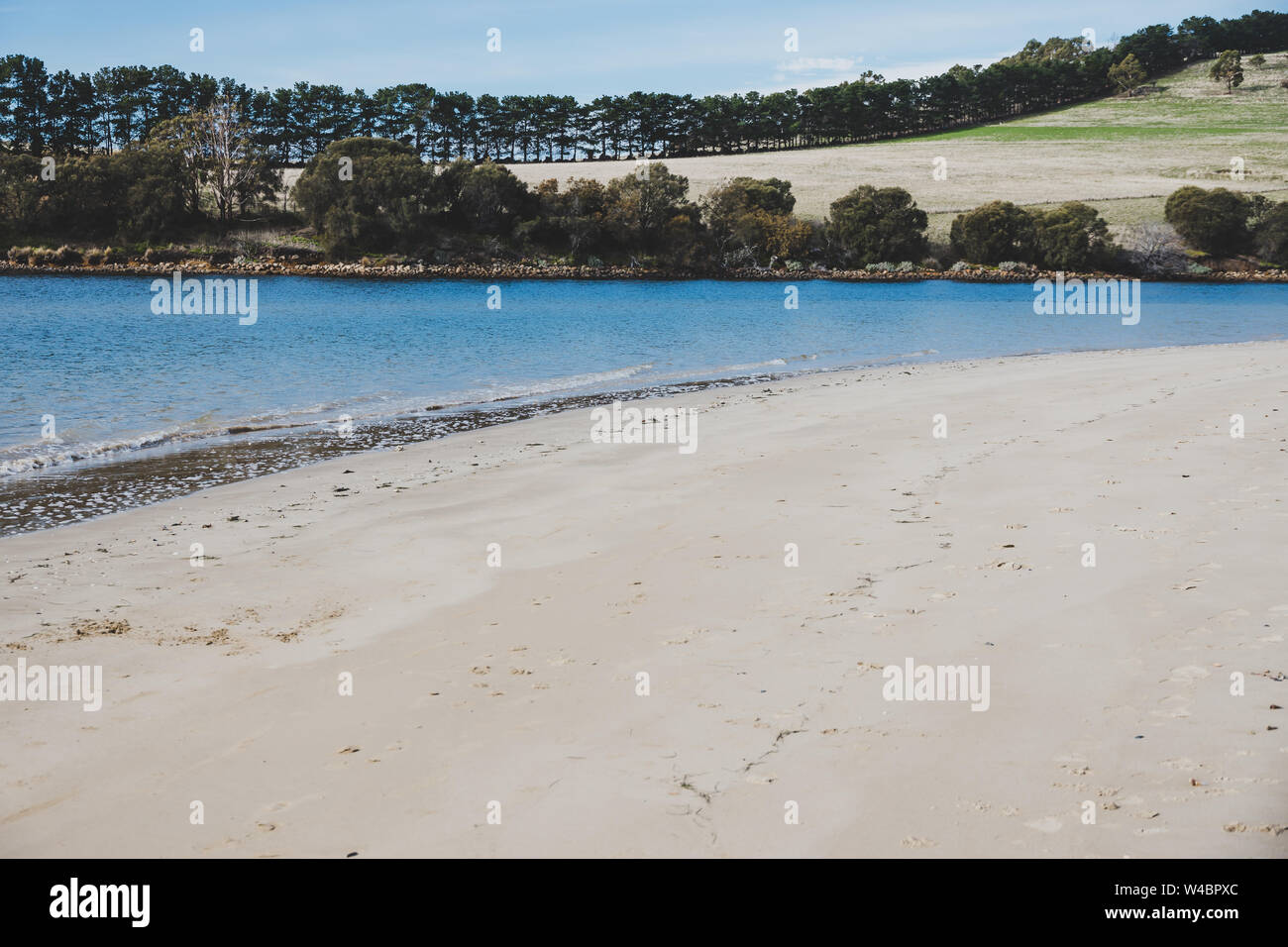 sunny Australian beach in Cremorne, Tasmania looking beautiful and