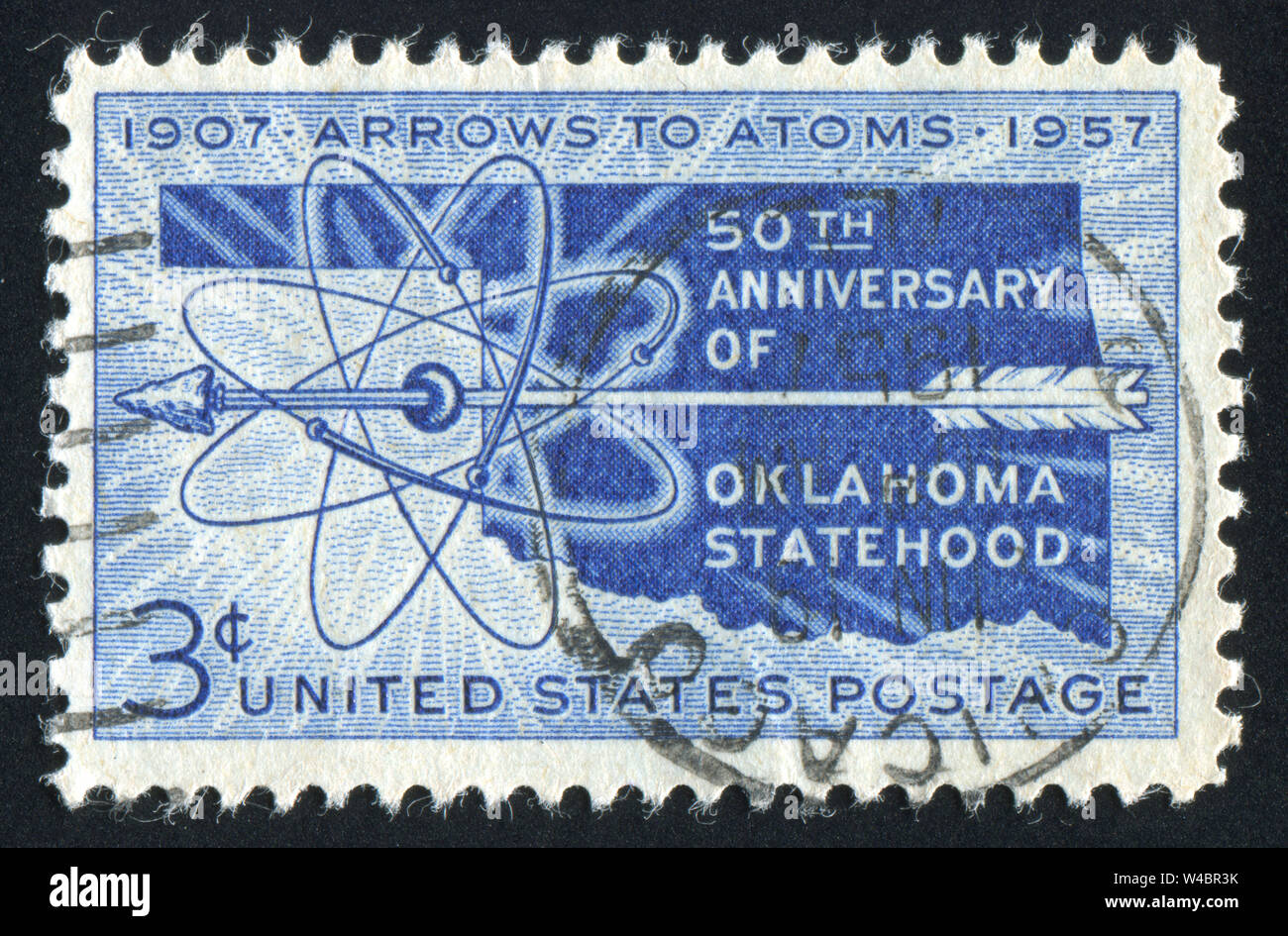 UNITED STATES - CIRCA 1957: stamp printed by United states, shows Map of Oklahoma, Arrow and Atom Diagram, circa 1957 Stock Photo