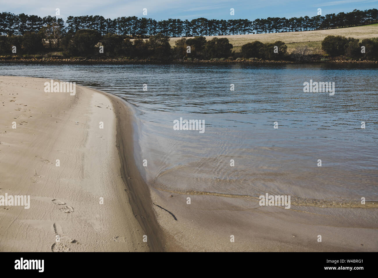 sunny Australian beach in Cremorne, Tasmania looking beautiful and