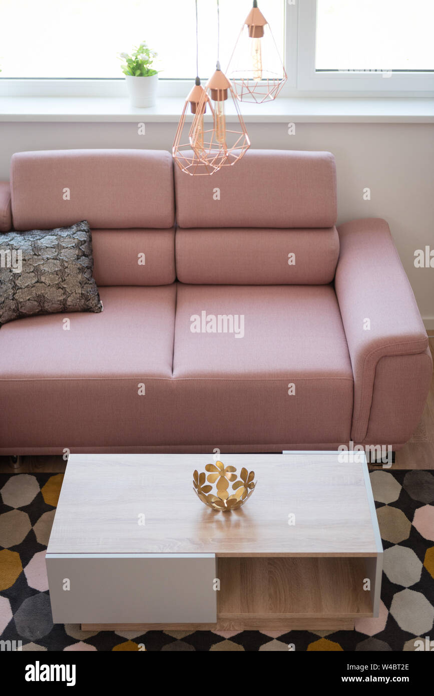 Table in contemporary living room interior Stock Photo - Alamy