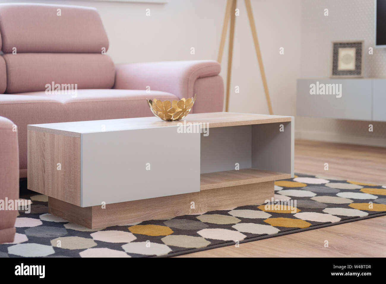 Table in contemporary living room interior Stock Photo - Alamy