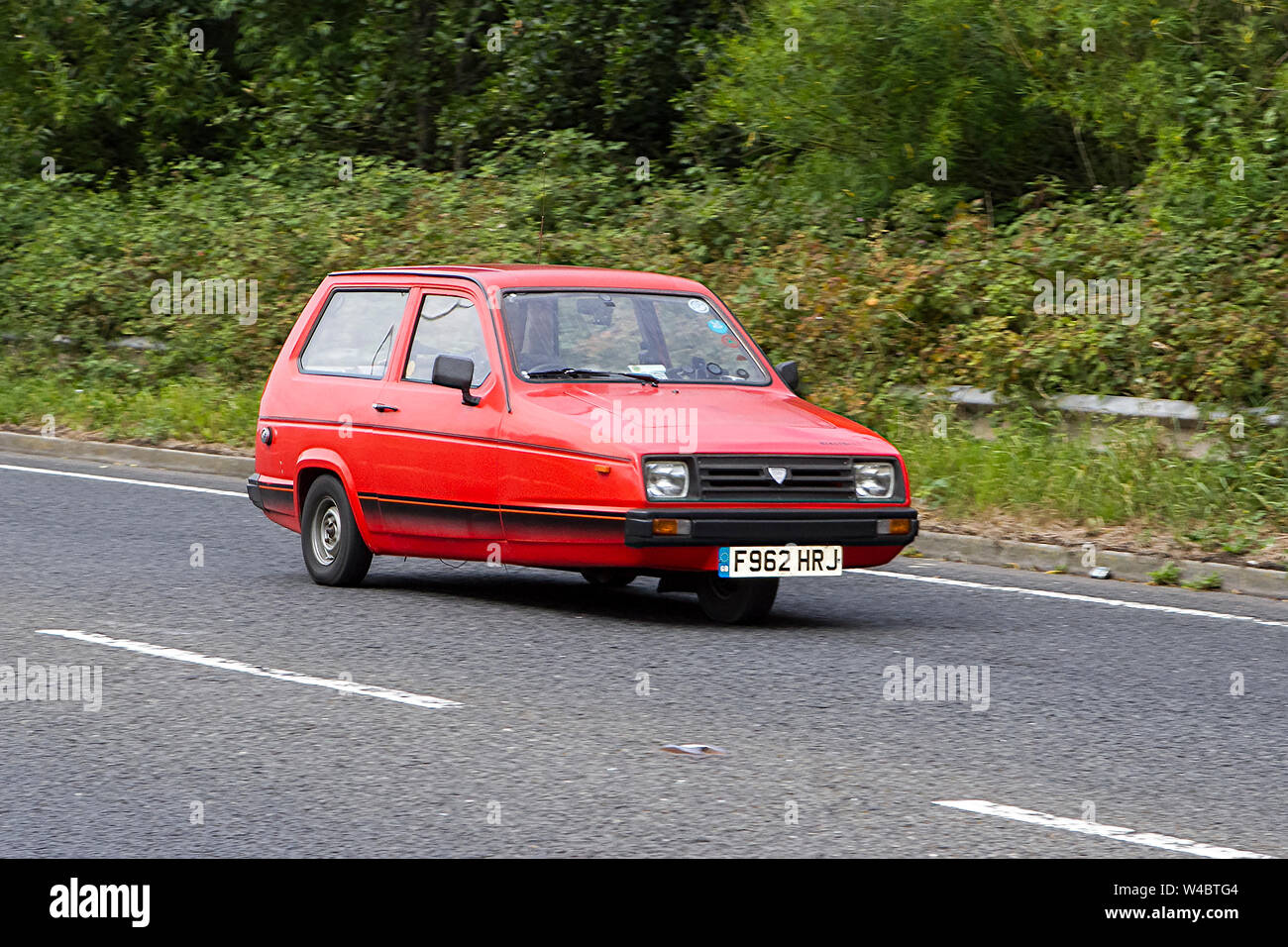 1989 80s eighties red Reliant Rialto VAN; Fleetwood Festival of Transport – Tram Sunday 2019 vintage vehicles and cars attend the classic car show Stock Photo