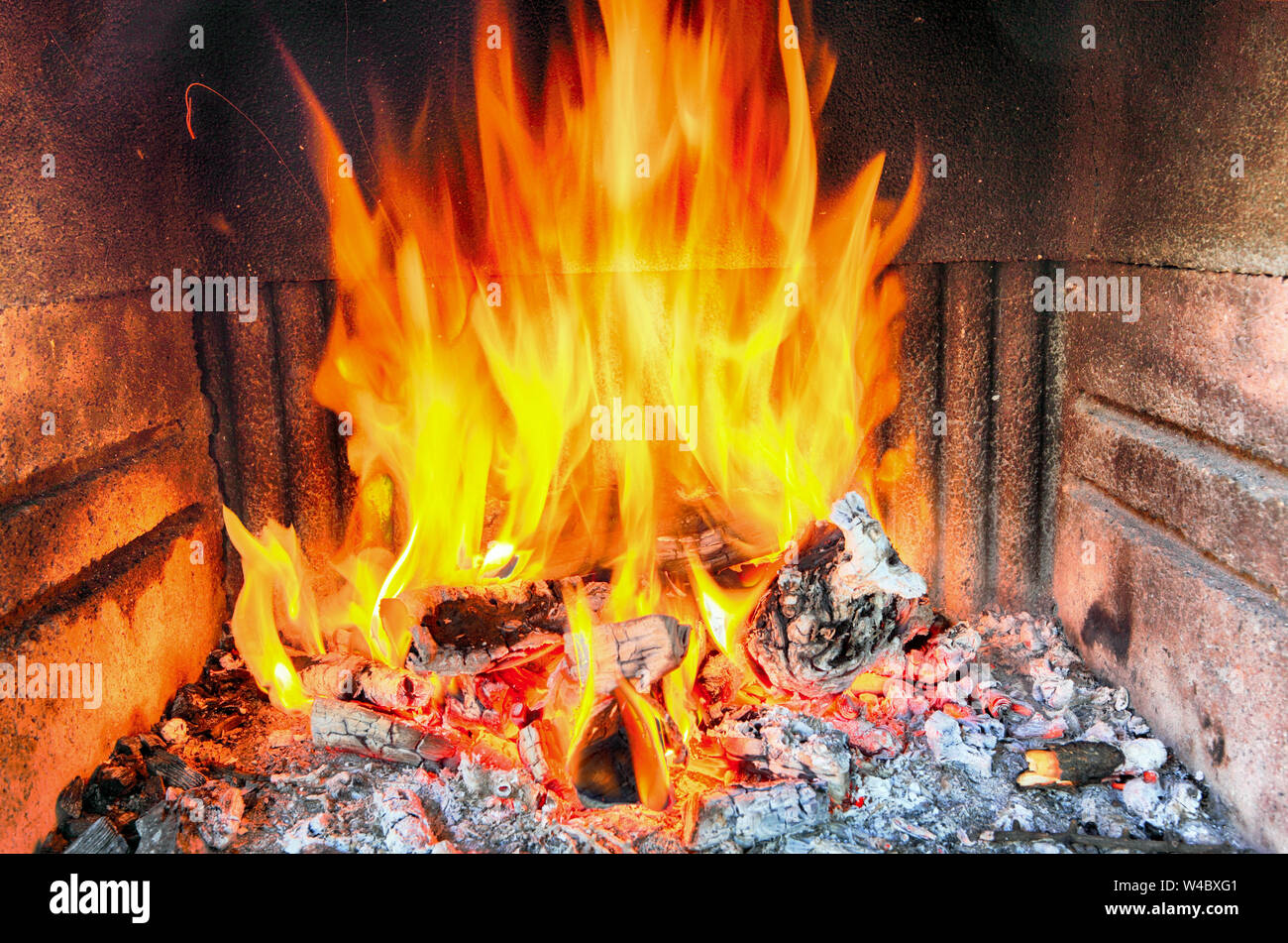 Fireplace with fire. Stock Photo
