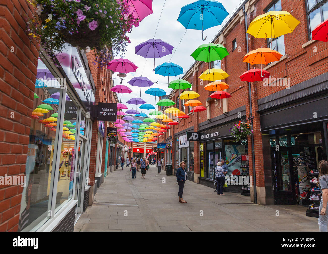 A colourful display of umbrellas hanging overhead in the Prince shopping precinct in