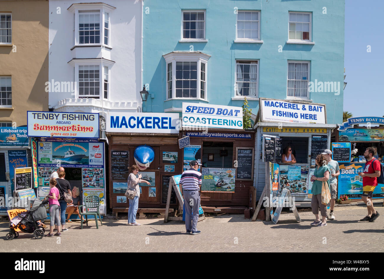 Fishing trips in the coastal town of Tenby, Pembrokeshire, Wales, UK Stock Photo