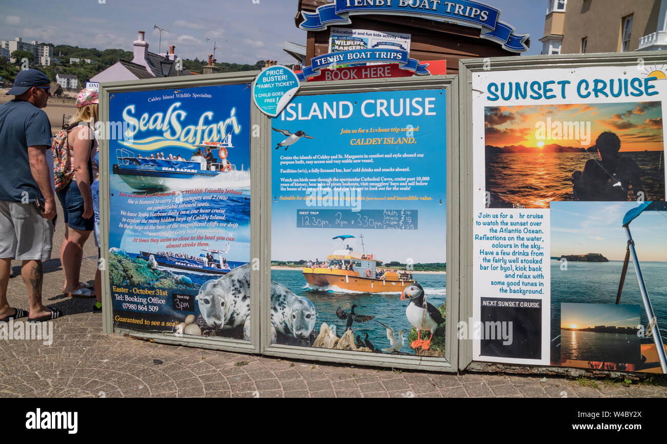 Banners promoting sea cruises on the British coast, Wales, UK Stock Photo