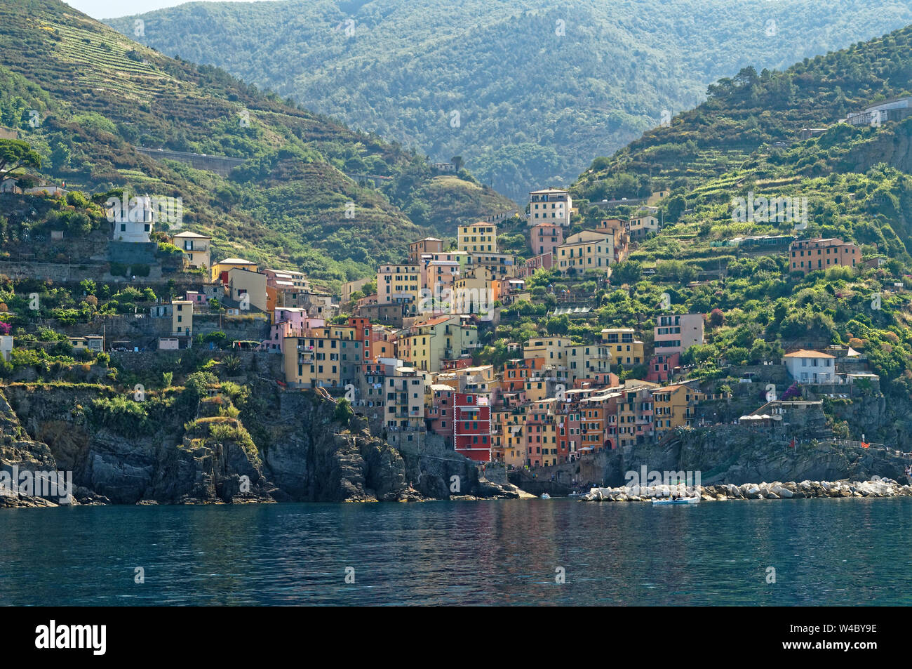 Riomaggiore village in Cinque Terre, Italian Riviera. View from sea. Stock Photo