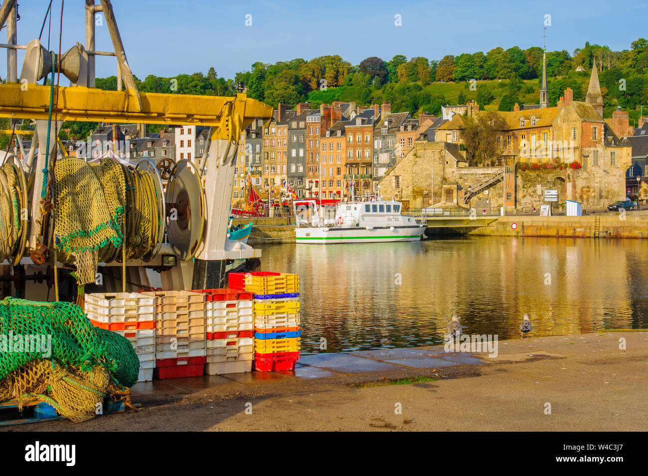 Scene of Vieux Port (Old Harbor), houses and boats in Honfleur, France  Honfleur is located in Calvados, Normandy. It is famous for its old port  Stock Photo - Alamy