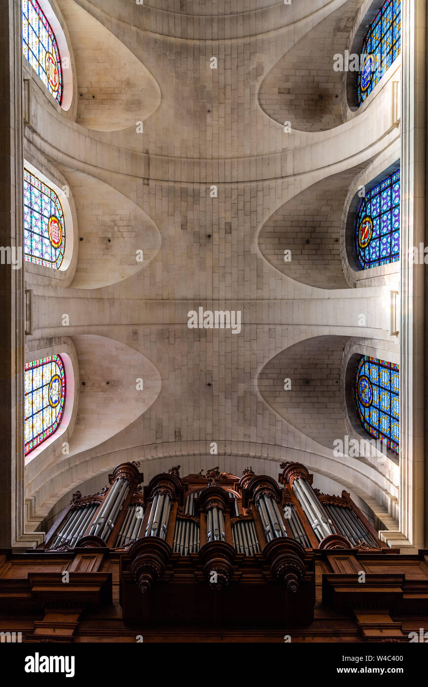 La Rochelle, France - August 6, 2018: La Rochelle Cathedral. Low angle interior view of the vaults and pipe organ Stock Photo