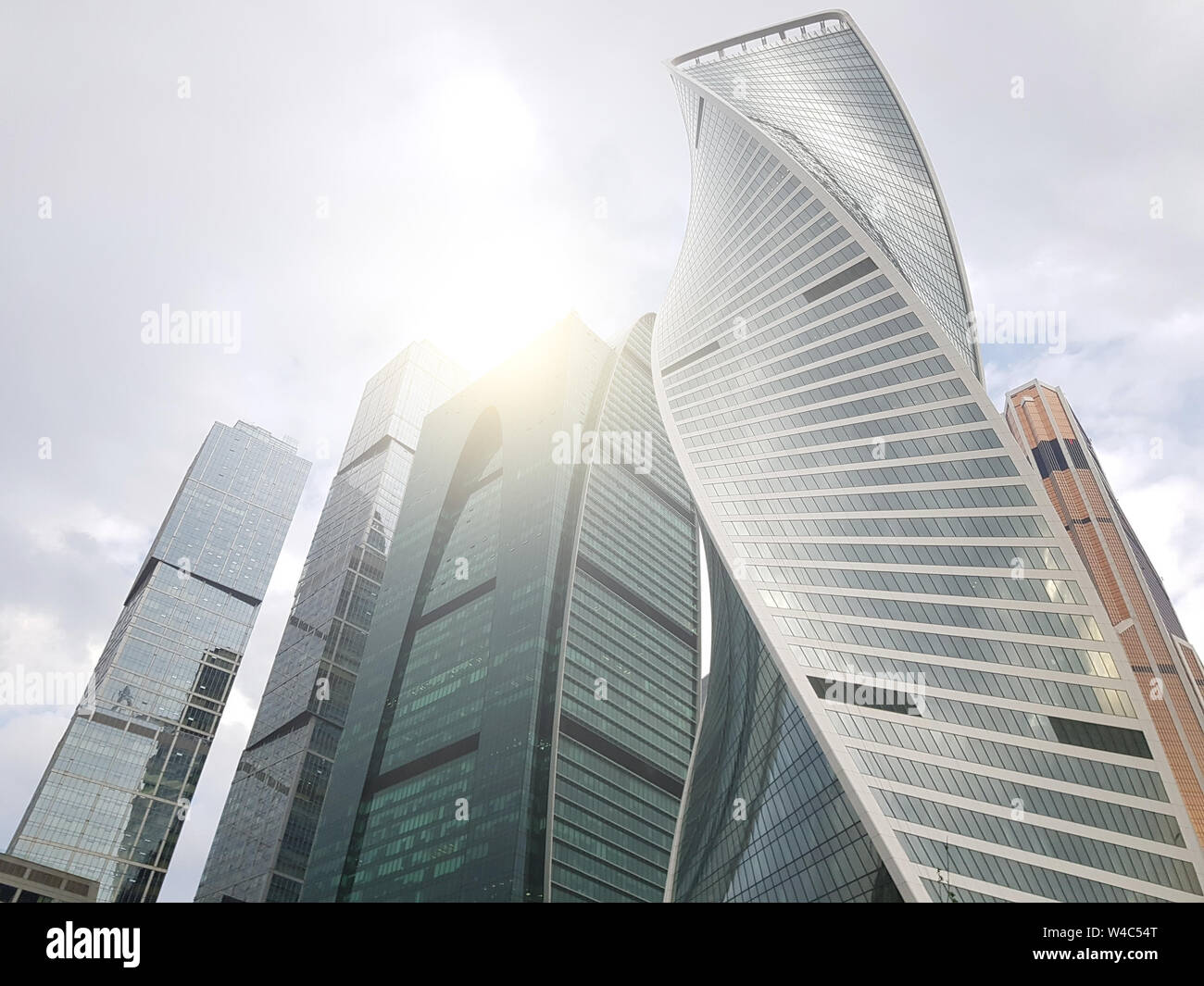 Image from below of tall buildings and blue sky Stock Photo