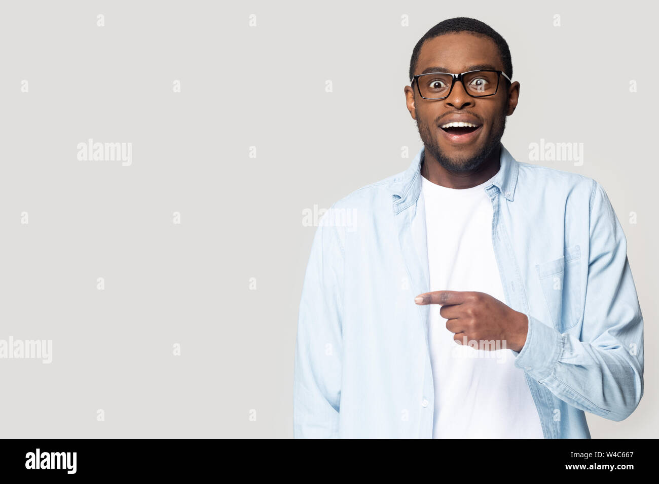 Excited amazed black man hi-res stock photography and images - Alamy
