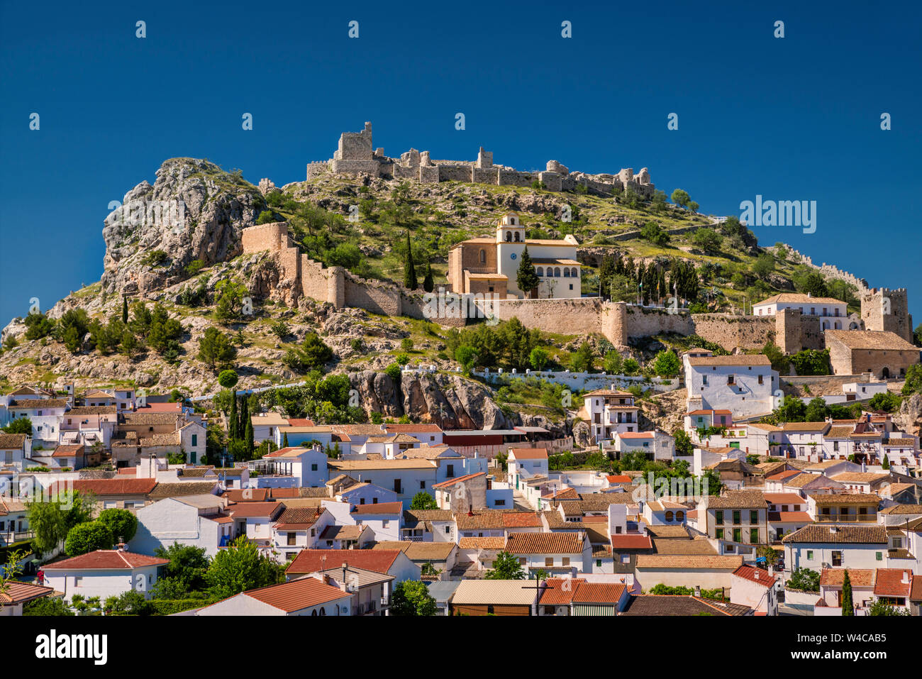 Moorish fortress over white town of Moclin, Granada province, Andalusia, Spain Stock Photo