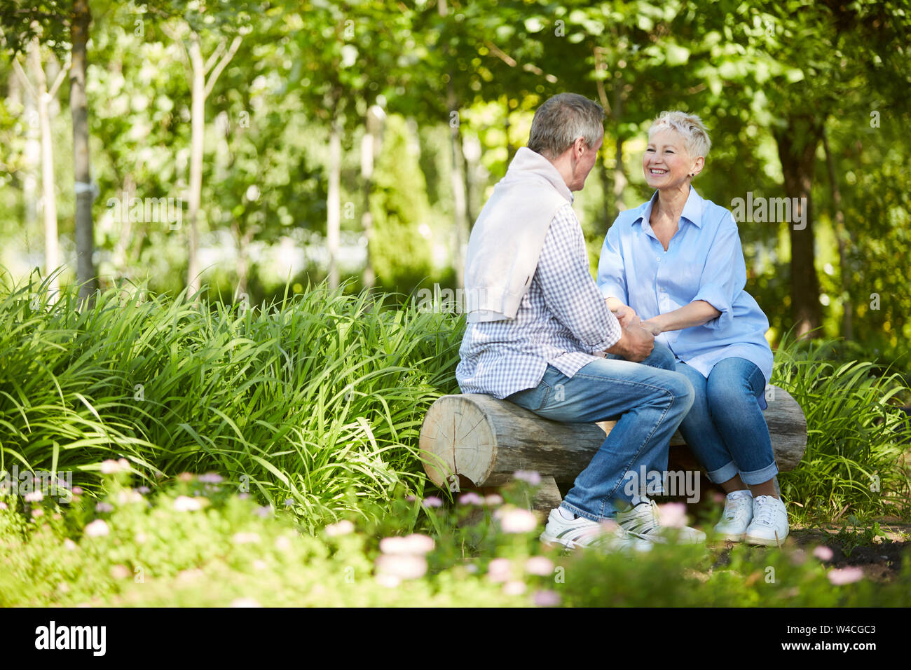 Happy middle aged woman full length hi-res stock photography and images ...