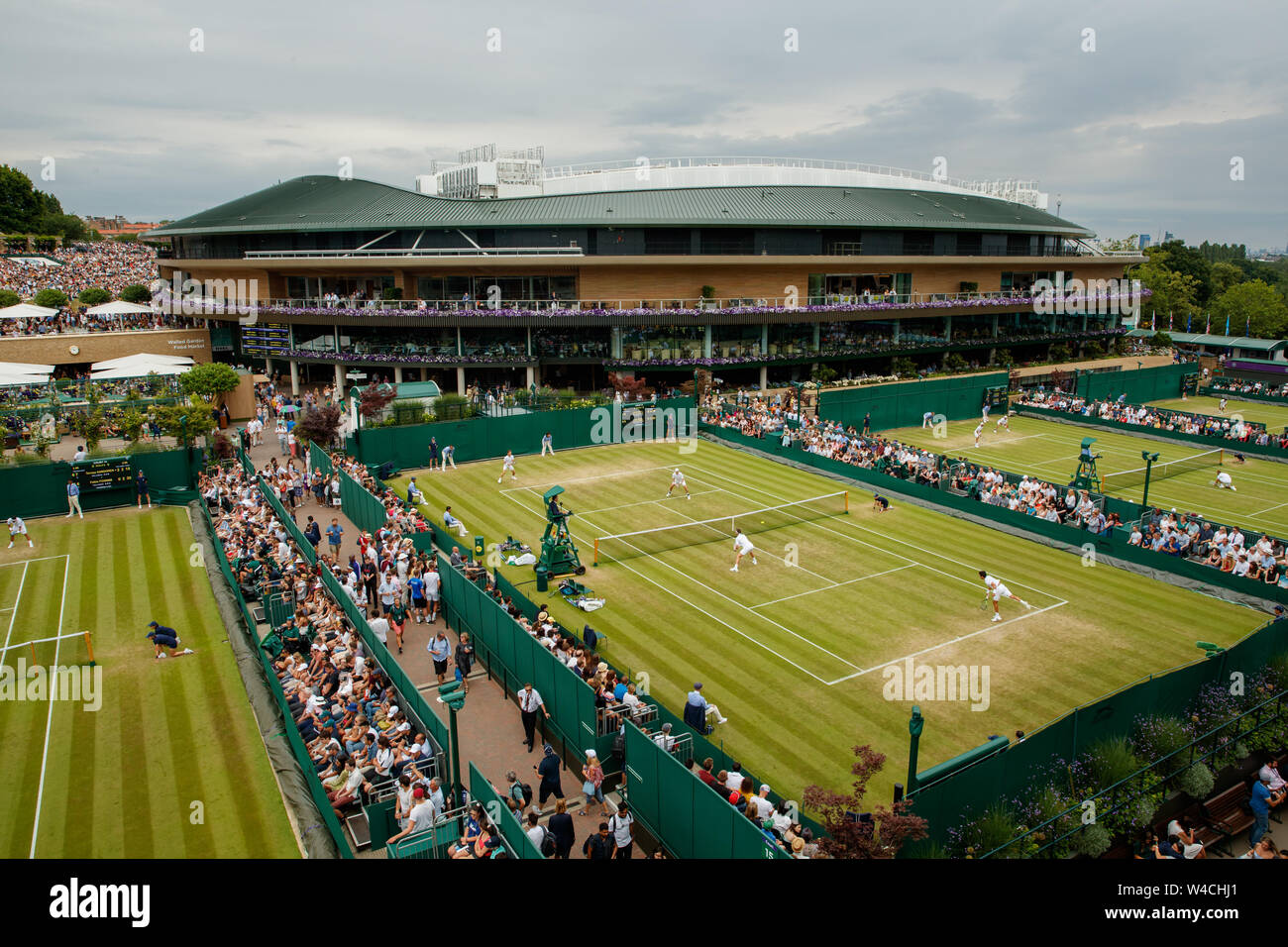 General view of action on Court 15 with No.1 Court behind at Wimbledon
