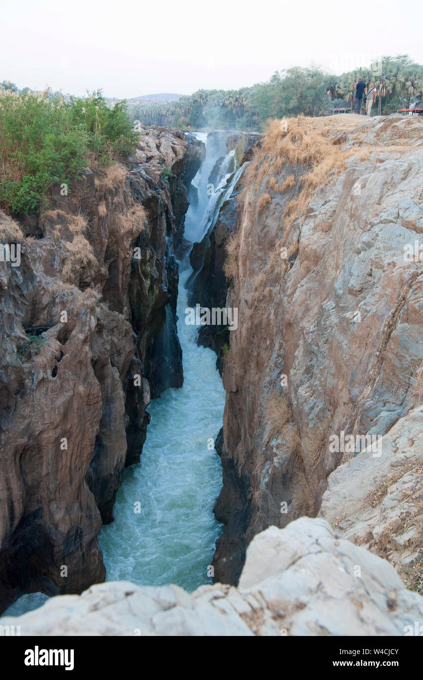 River rushing over jagged cliffs, Epupa falls Cunene River in Namibia on the border with Angola Stock Photo