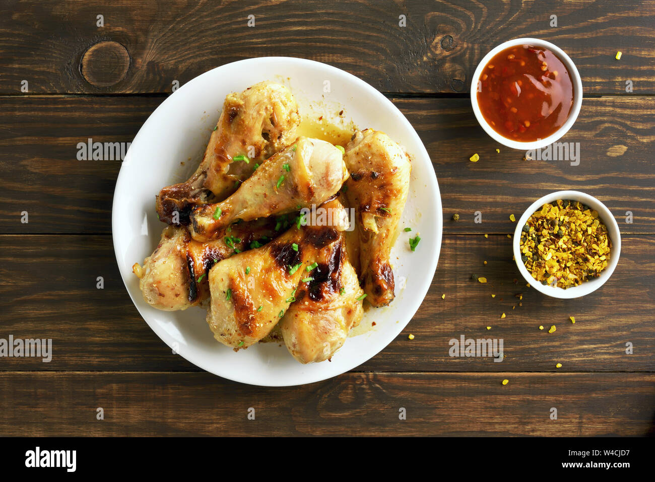 Fried chicken drumstick on white plate, top view Stock Photo