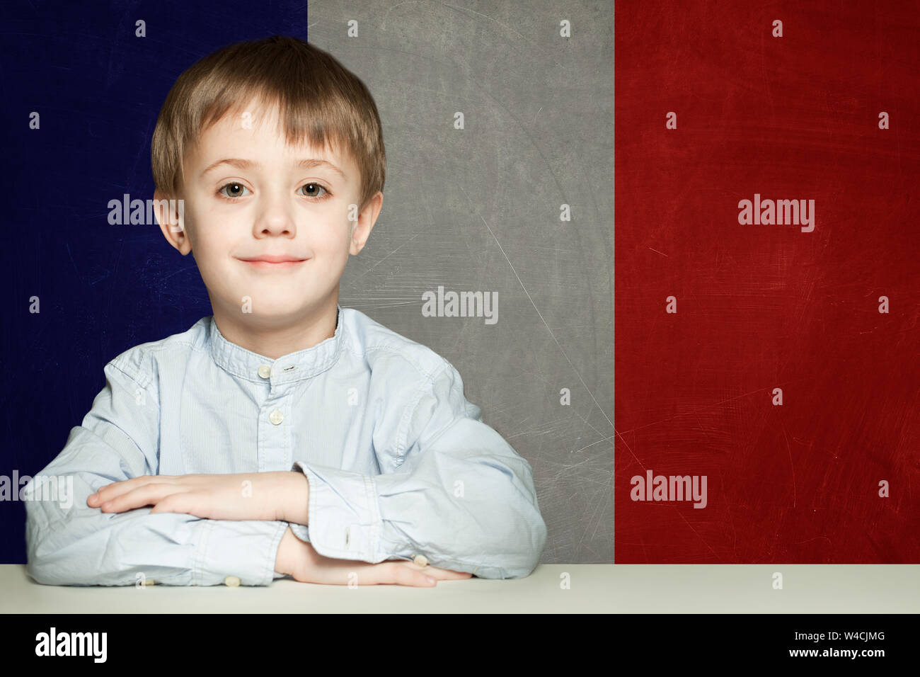 Learn french language concept. Happy child student with flag France Stock Photo Alamy