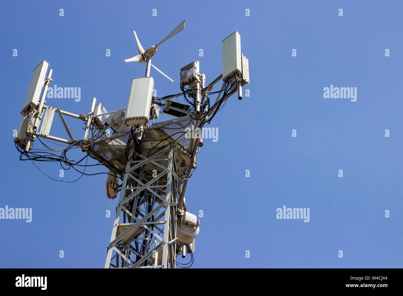 Cellular Base Station or Base Transceiver Station. Telecommunication tower. Wireless Communication Antenna Transmitter. 3G, 4G and 5G Cell Site with Stock Photo