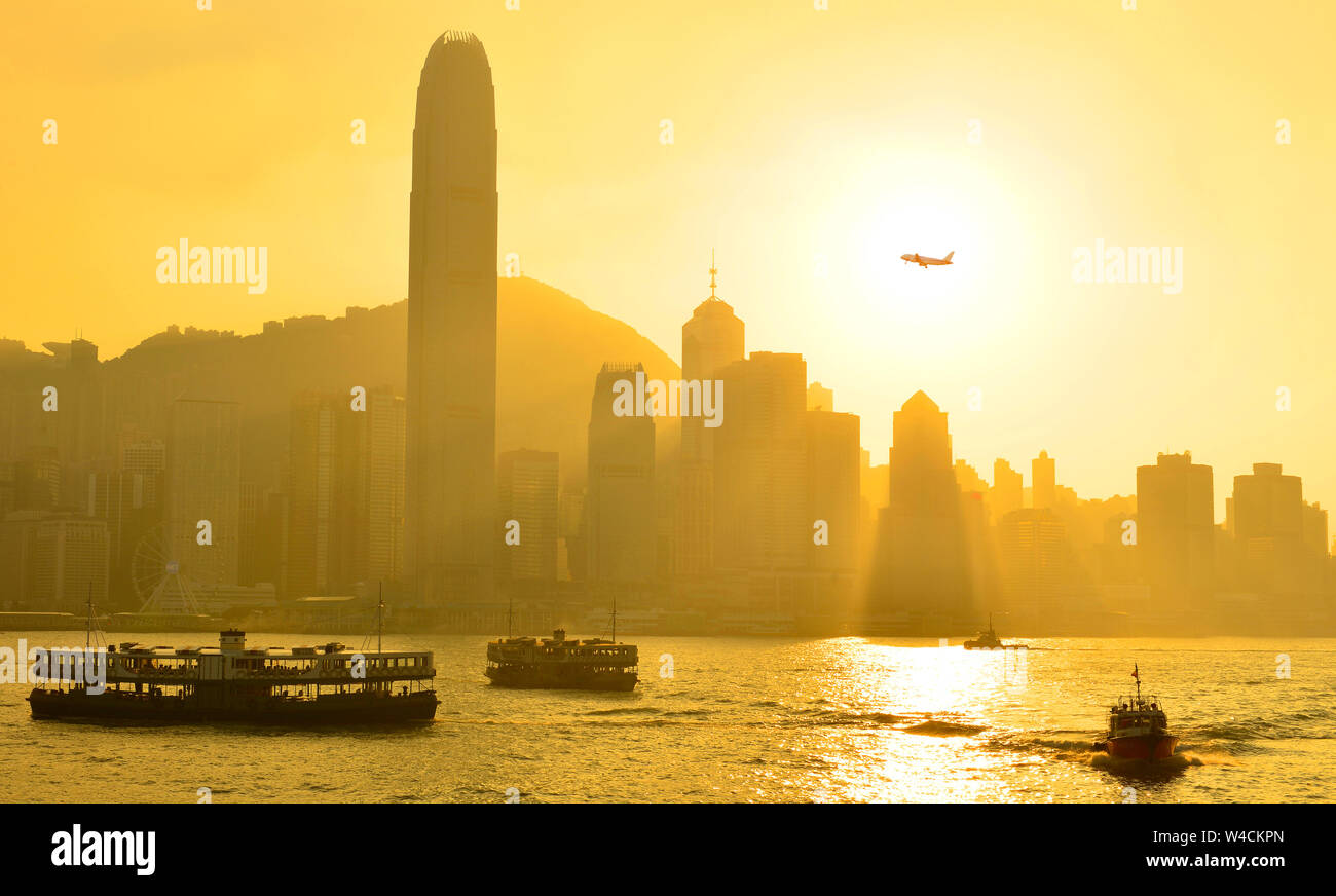 Skyline of Hong Kong sunset at Victoria Harbor Stock Photo - Alamy