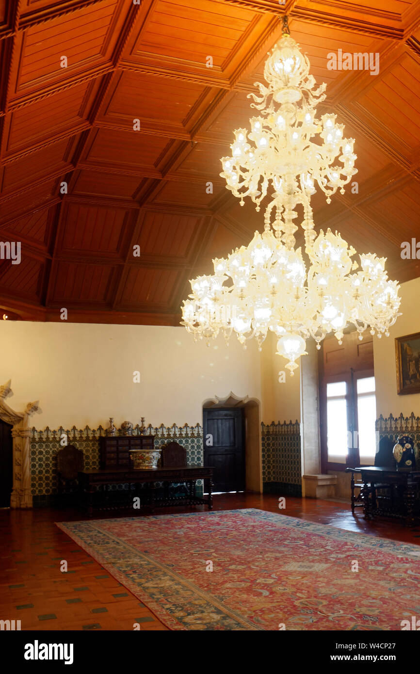 large chandelier lighted, ornate, wood ceiling, oriental rug, Palacio National; UNESCO site