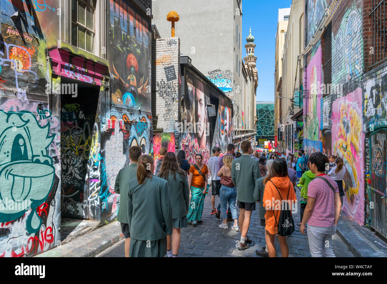 Tourists viewing street art on Hosier Lane in the Central Business District, Melbourne, Victoria, Australia Stock Photo