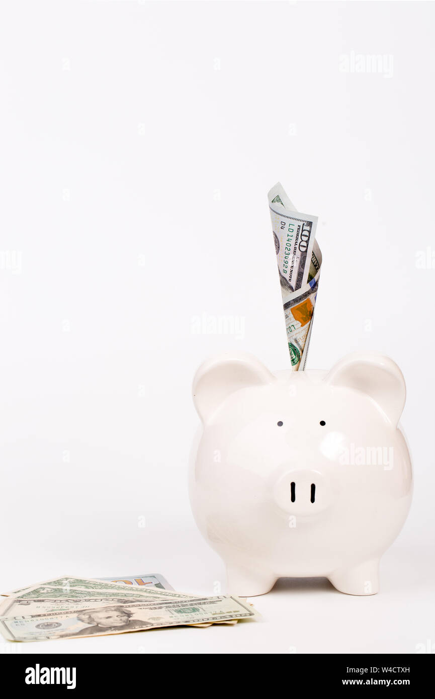 piggy bank and banknote on white background Stock Photo - Alamy