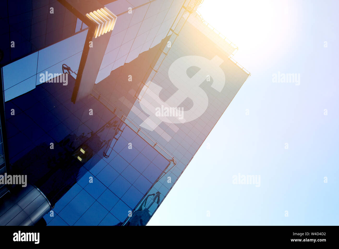 Modern office building with sign dollar on a background of the blue sky ...