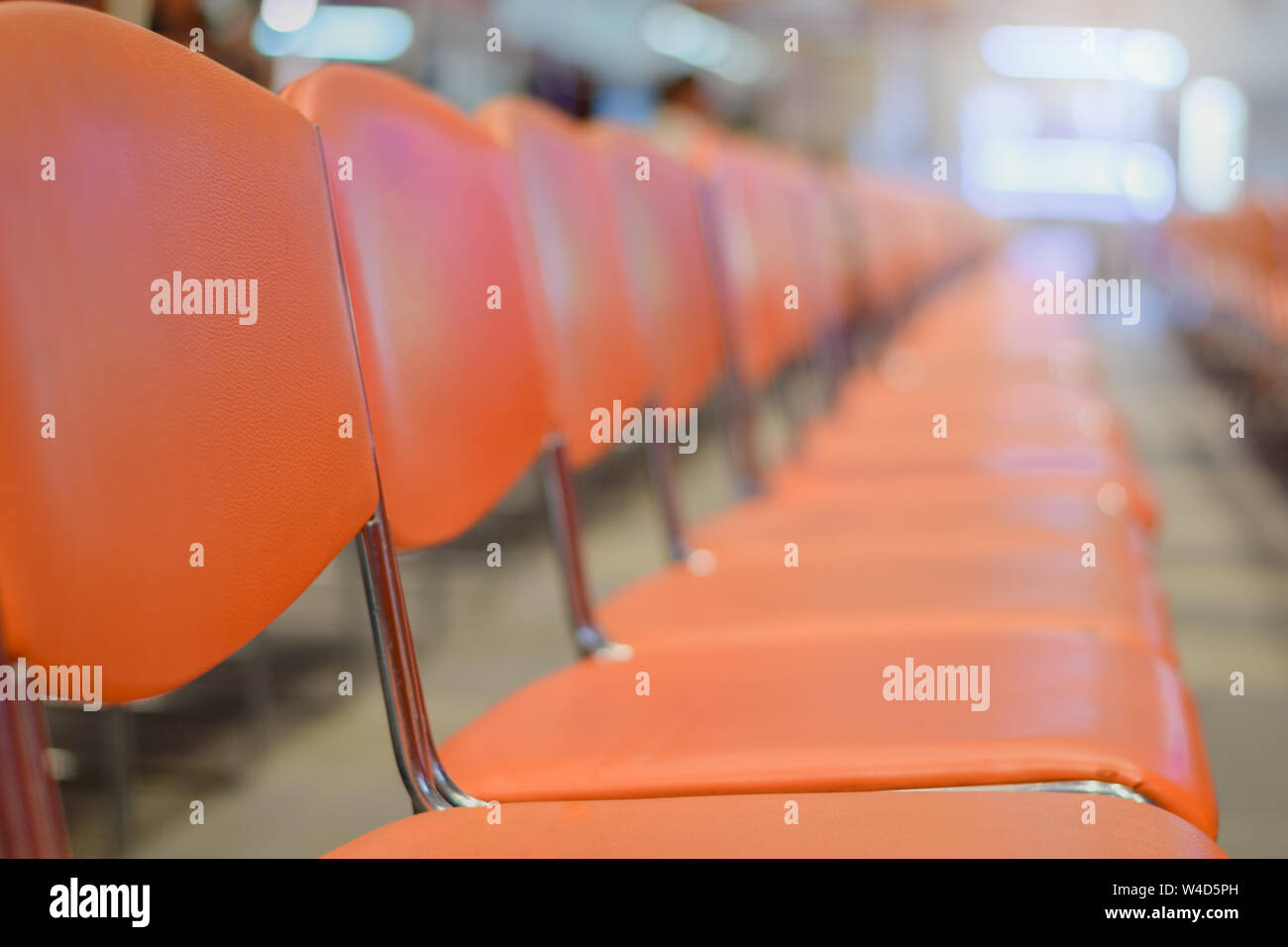 Close up Row of blank chairs in seminar room. seats in an empty conference room Stock Photo