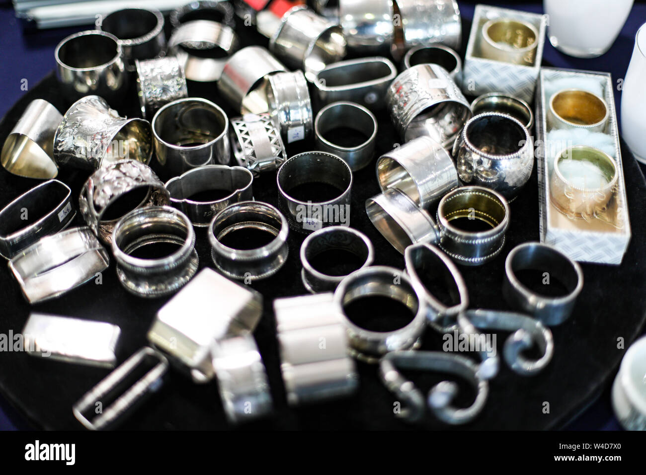 Variety of old silver napkin rings at Retro and Vintage Design Expo in Helsinki, Finland Stock Photo