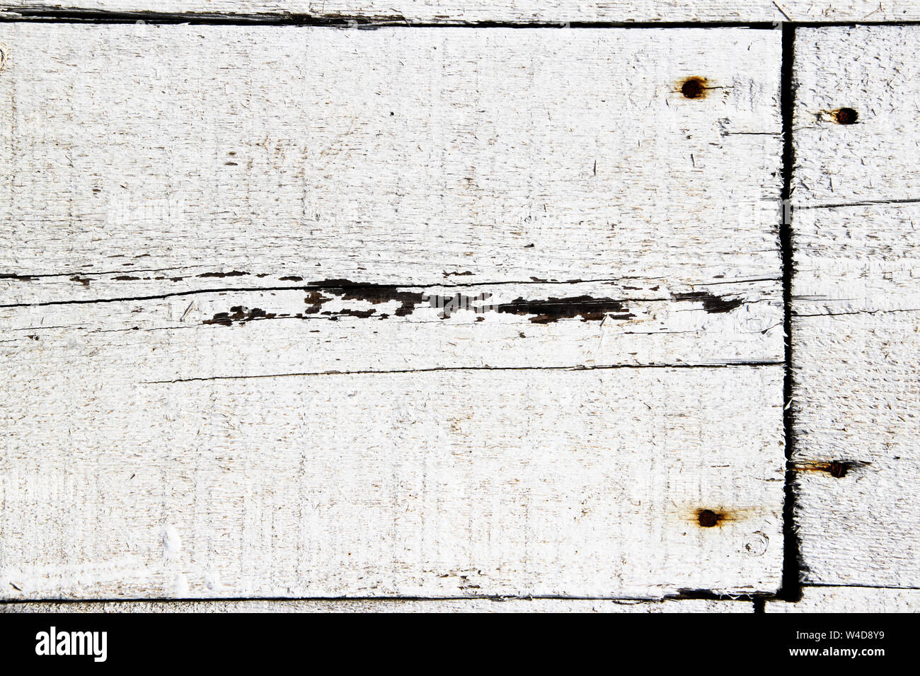White wooden rustic planks attached with rusty nails Stock Photo