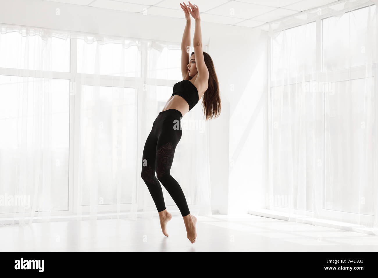 Beautiful Woman Training Contemporary Ballet In Studio, Copy Spa Stock Photo