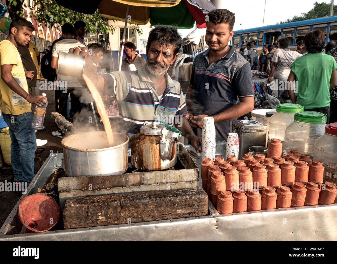 An unidentified Tea seller making and selling tea on the street of Kolkata  Stock Photo - Alamy
