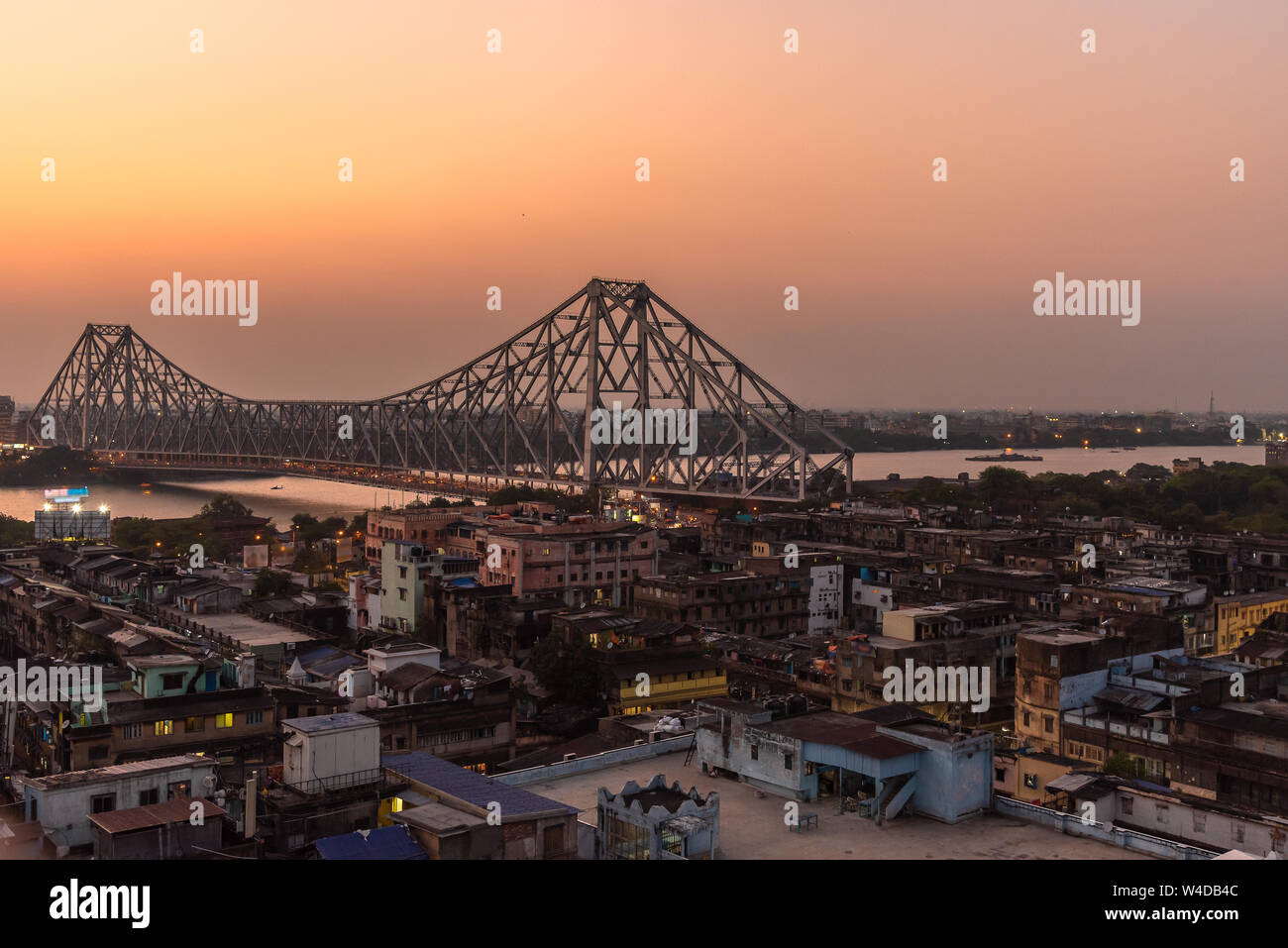 Aerial View of Famous Howrah bridge/ Rabindra Setu along with cityscape of Kolkata City. Stock Photo