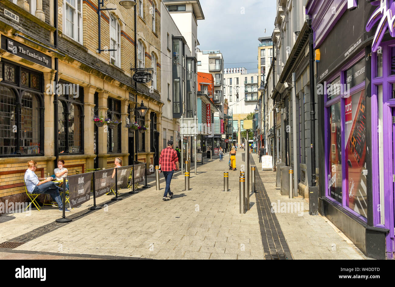 CARDIFF, WALES - JULY 2019: Caroline Street in Cardiff city centre. It is popular with people seeking curry and chips after a night out. Stock Photo