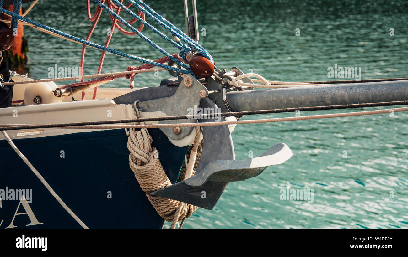 Bow of the traditional sailing boat with anchor and bowsprit. Stock Photo