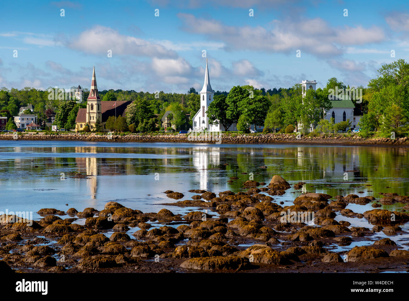Three churches along the waterfront in Mahone Bay, Nova Scotia, Canada. Stock Photo