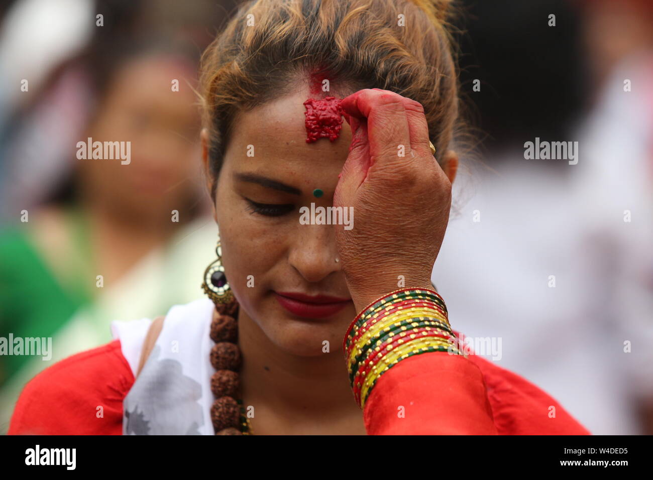 Kathmandu, Nepal, 22 July, 2019. A large number of devotees flocked to Shiva Temples on Shrawan. Devotees fast for entire month-especially on monday. Stock Photo