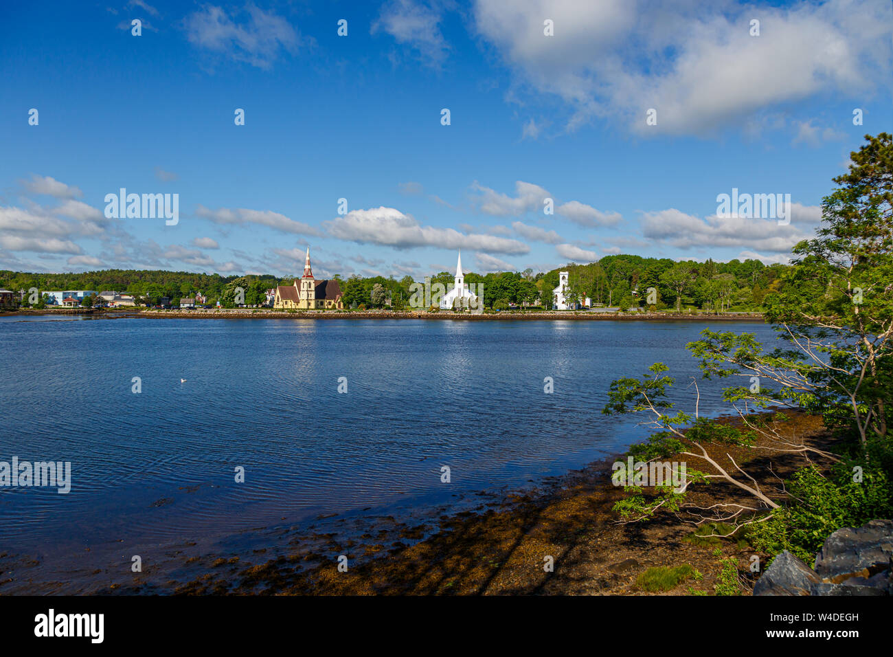 Three churches along the waterfront in Mahone Bay, Nova Scotia, Canada. Stock Photo