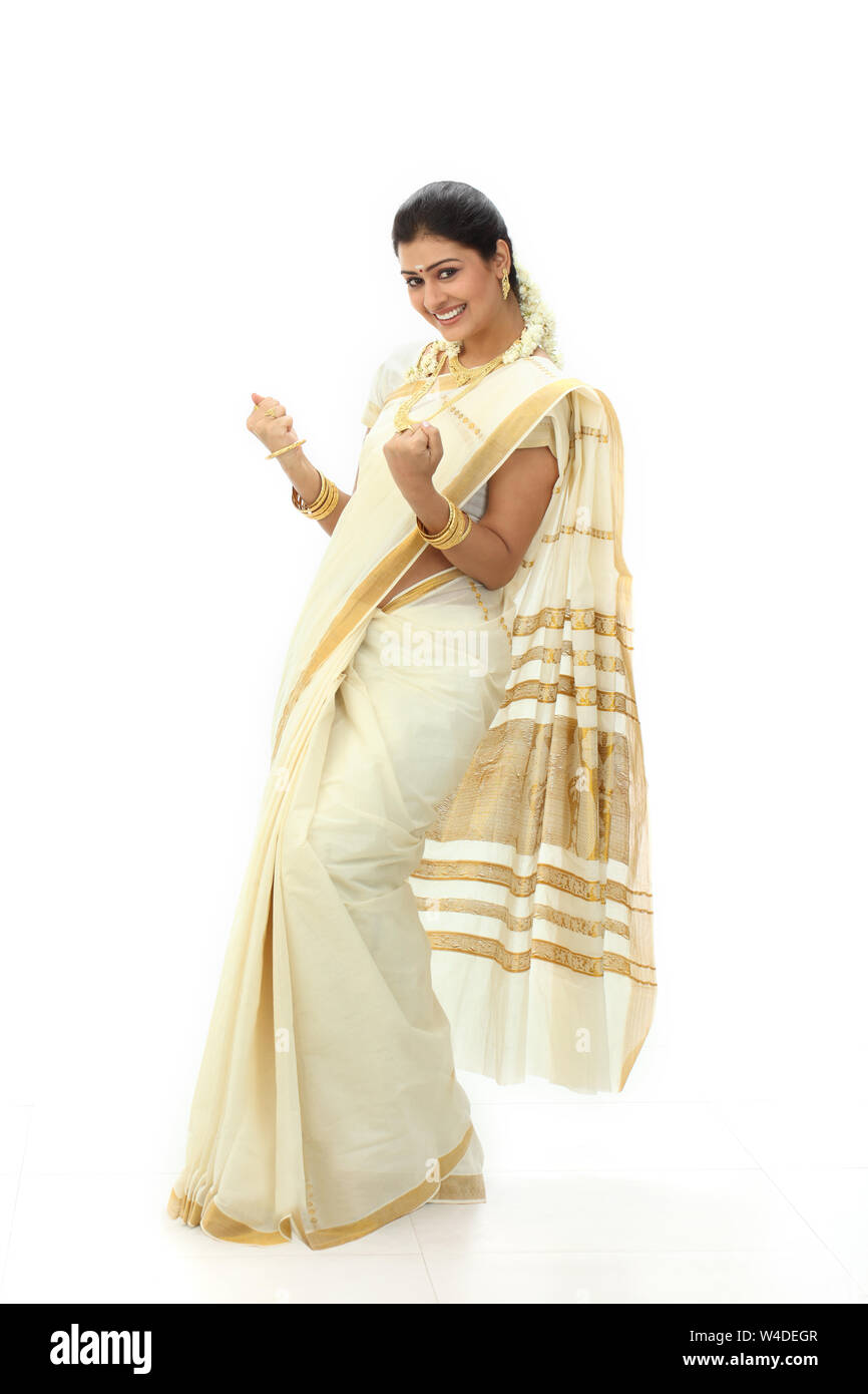 South Indian woman standing and smiling Stock Photo - Alamy