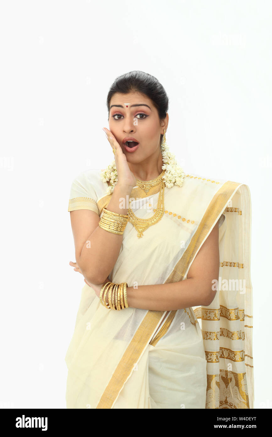 Portrait of a south Indian woman looking shocked Stock Photo - Alamy