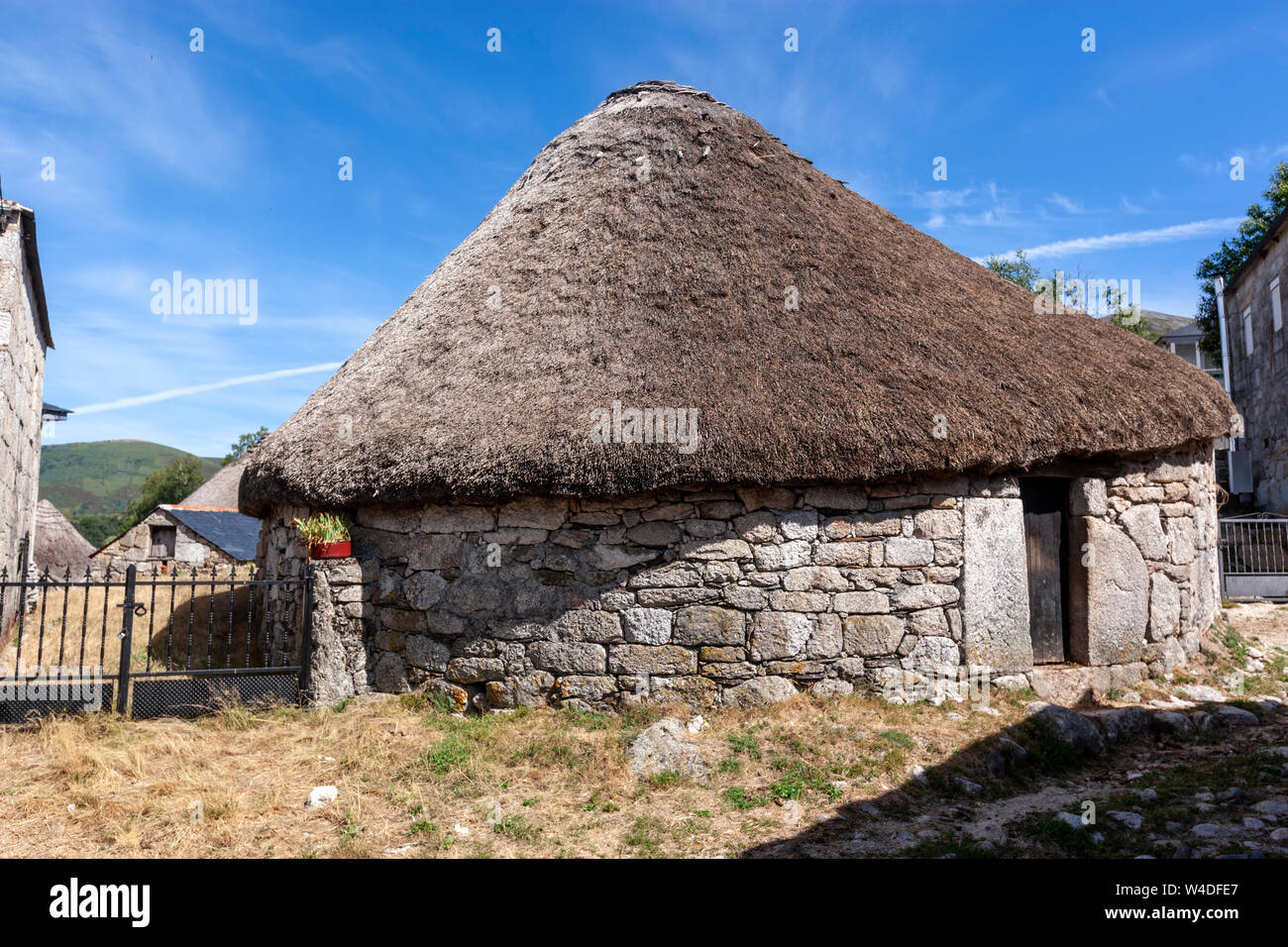 Well preserved palloza or traditional house and horreos in ,Piornedo, Ancares, Lugo province, Galicia, Spain Stock Photo