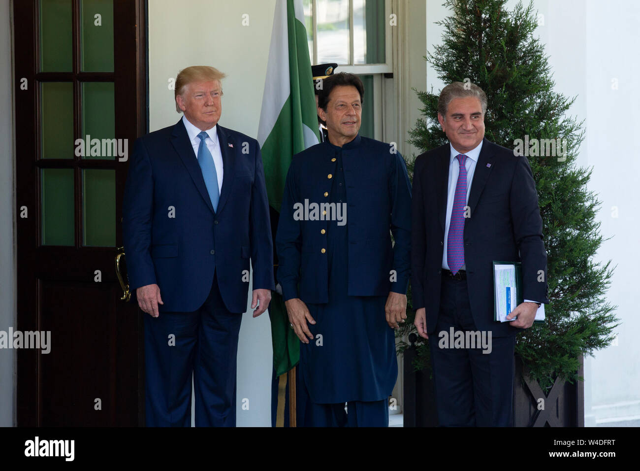 United States President Donald J. Trump greets the Prime Minister of the Islamic Republic of Pakistan Imran Khan as he arrives to the White House in Washington, DC, U.S. on July 22, 2019. Credit: Stefani Reynolds/CNP /MediaPunch Stock Photo